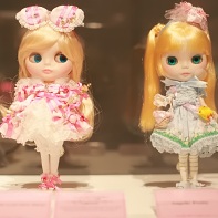 The Blythe dolls outfitted by the gothic lolita fashion labels Baby, the Stars Shine Bright (left) and Angelic Pretty (right).
