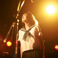 Performer Mariko Akahi (紅日毬子) of the Japanese underground theater company 虚飾集団廻天百眼 (Kyoshoku Shūdan Kaiten Hyaku-me) in the limelight.
