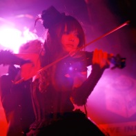 Violinist Jill of the dark wave duo Rose Noire playing at Live Inn Rosa.