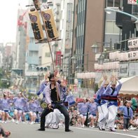 A dance group performs on one the large shopping streets at the Kōenji Awa Odori.