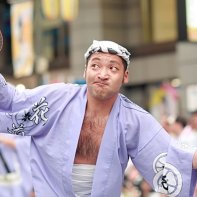 A man doing the traditional 'silly dance' at the Kōenji Awa Odori.
