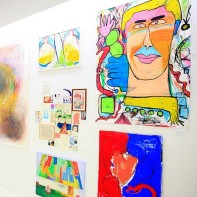 Lots of colorful paintings displayed in 3331 Chiyoda Arts.