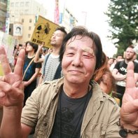 A Japanese man injured by the police still determined to continue protesting.