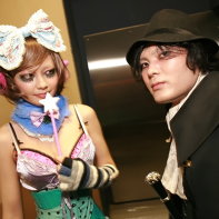 Japanese goth couple of a cute magical girl and an elegant aristocrat.