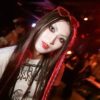 Goth club party girl Chiaki dancing at the Live Inn Rosa.