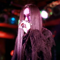 PeaceToPieces' Ryo☆Kiralin singing live on stage.
