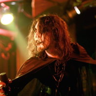 Tak, the programmer and bass player of Zwecklos.