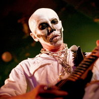 Guitar player Multico Honekawa of Hernia 44 with skeleton skull make-up.
