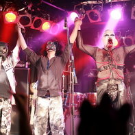 Hernia 44's line-up at the end of their live show, including their drummer Takayuki.