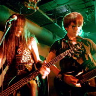 Zodiaque's bassist Ken and guitarist Jun playing side by side.