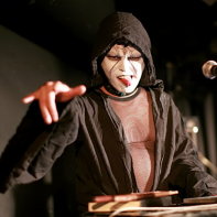 Vanished Empire's programmer and synth player Dee Lee greeting the crowd at Live Inn Rosa.