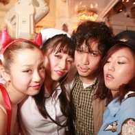 Japanese DJ Takeru with three female friends in the White Room.