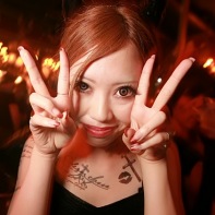 Another girl with scarily large big-eye contact lenses.