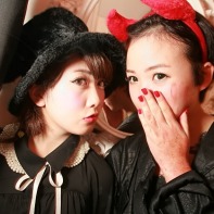 Two Japanese girls dressed in black for the Mysterious Halloween Night event.