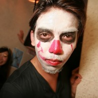 A kakoi Japanese guy with white and red facepaint for Halloween.