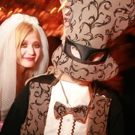 A couple in some very strange fashions at the Mysterious Halloween party.