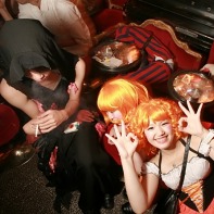 A look at the seating area reveals sleepy, sleeping and still active partygoers.