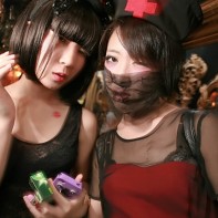 Two female guests in fashionable outfits in the Trump Room.