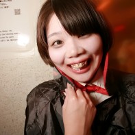Japanese girl with Dracula's cape.