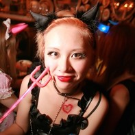 Japanese girl in her classic black devil Halloween outfit.