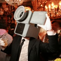 A Japanese guy in disguised as a real 'cameraman'.