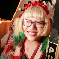 Blonde Japanese girl in a fun outfit.