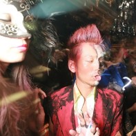 The busy party crowd in the Trump Room at the Noir Halloween event.