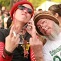 Two Japanese reggae fans flipping the bird