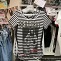 Engrish t-shirts seen in Nippori